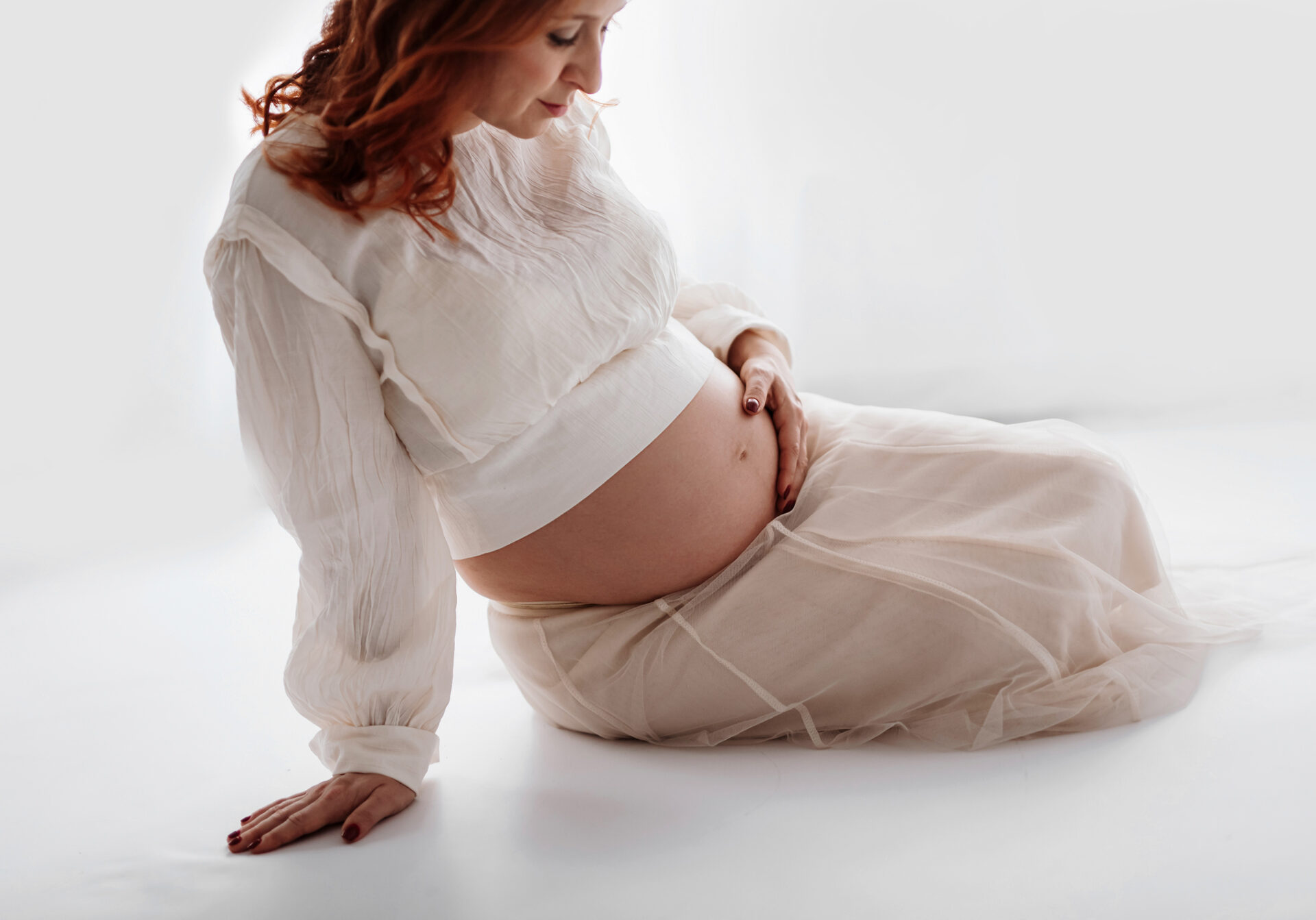 Schwangerschaft Familien Fotoshooting im Fotostudio